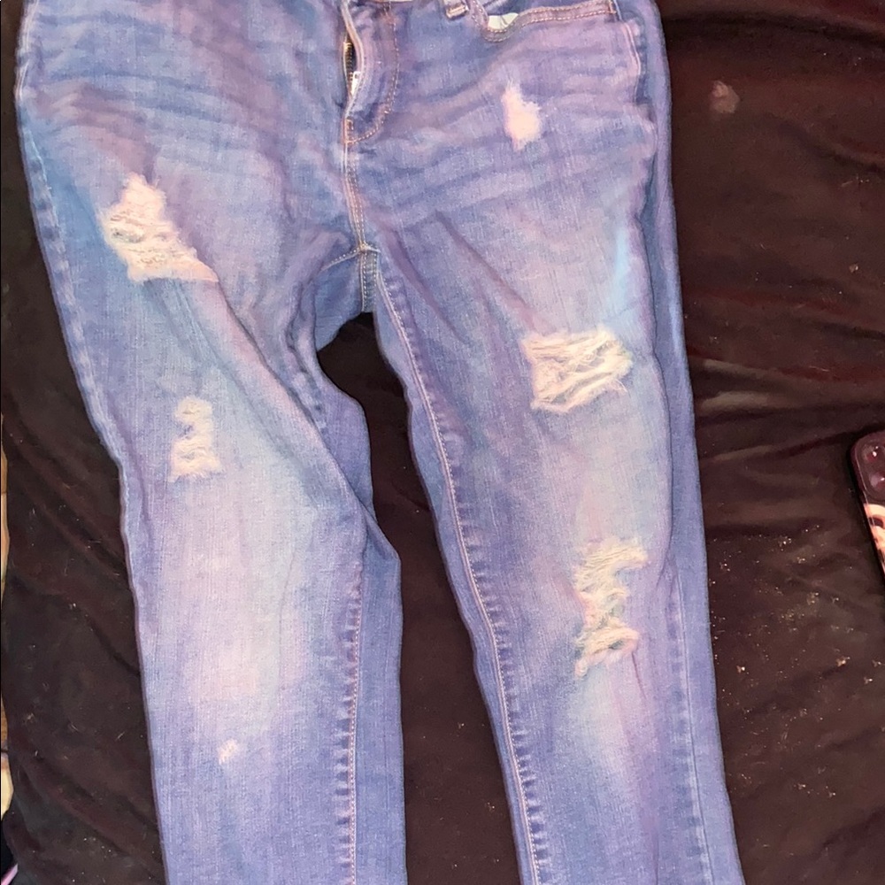 Distressed Blue Denim Jeans